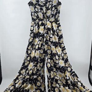 Free People Little of your love smocked, wide leg, floral jumpsuit Sz L